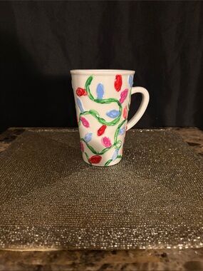 White Ceramic Mug with Multicolor Light-Bulb Motif